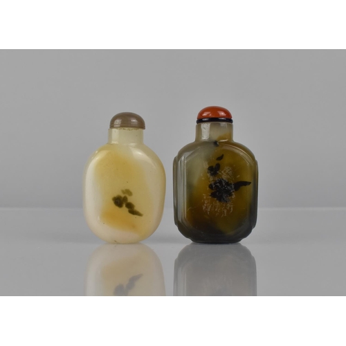 458 - A Chinese White and Russet Jade Snuff Bottle together with a Further Pale Celadon and Jade Example h... 