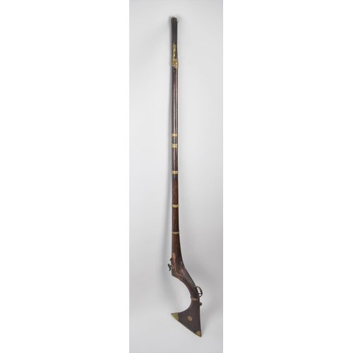 146 - A 19th Century Afghan Percussion Lock Jehail, Wooden Stock with Brass Cladding, Total Length 160cms