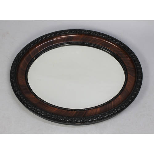 126 - A Mid 20th Century Oval Wall Mirror, 85cms Wide