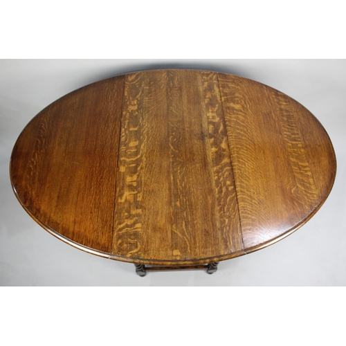 131 - A Mid 20th Century Oak Drop Leaf Gate Leg Dining Table with Oval Top and Barley Twist Supports, 101c... 