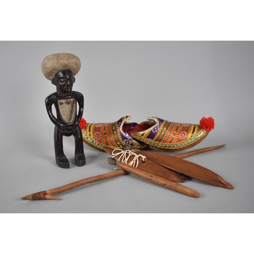 132 - An African Fertility Doll together with a Pair of Persian Slippers Etc