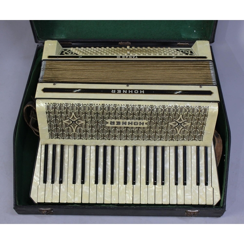 143 - A Vintage Hohner Tango III Piano Accordion in Carrying Case