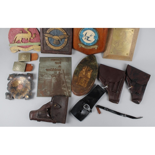 184 - A Collection of Various Militaria to include Leather Holsters, Squadron Plaques, Trench Art Bowl, Be... 