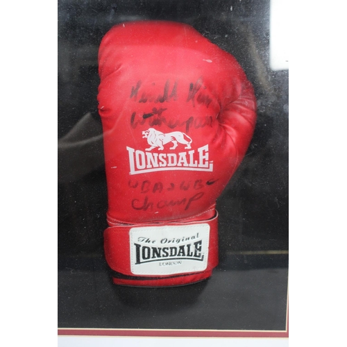 200 - A Framed Commemorative Autographed Boxing Glove, 