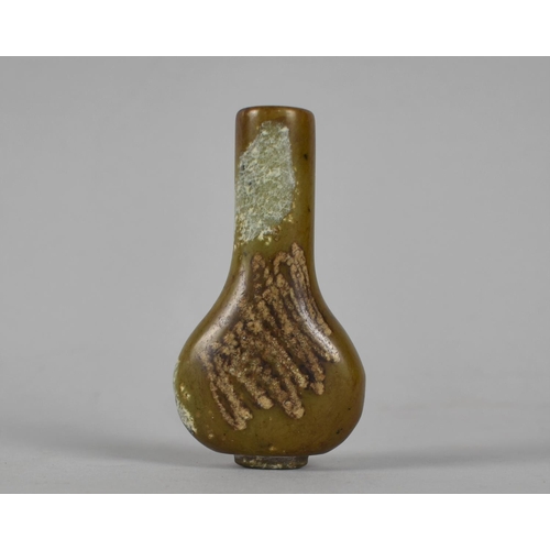 209 - A Carved Hardstone Snuff Bottle, 8cm high