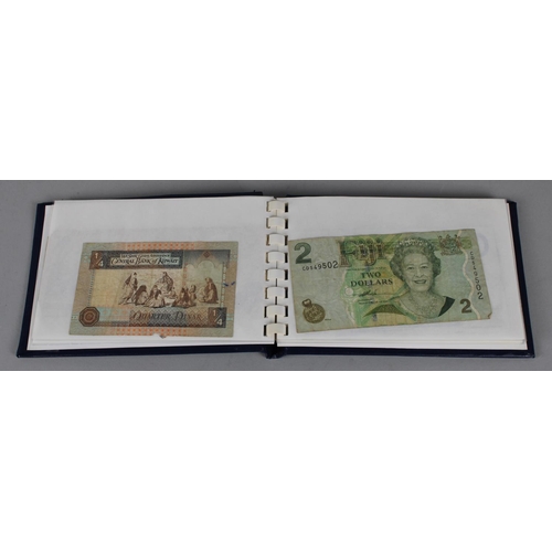 215 - A Collectors Booklet of Foreign Bank Notes to Include US $2 Bill, Fijian $2 Bill etc