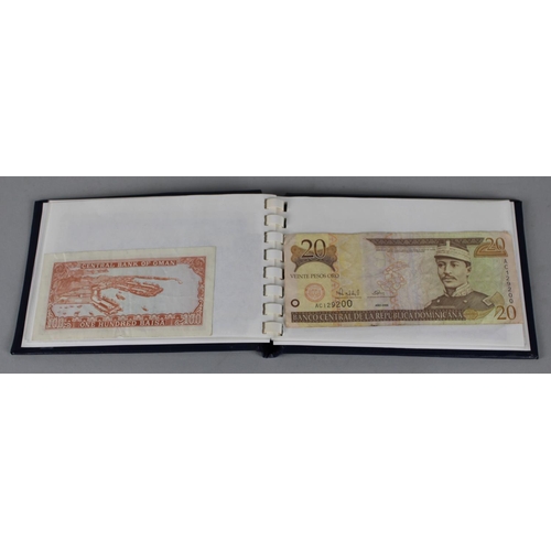 215 - A Collectors Booklet of Foreign Bank Notes to Include US $2 Bill, Fijian $2 Bill etc