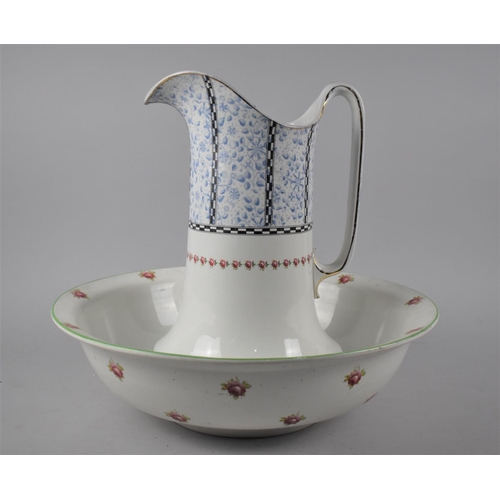 273 - A Mid 20th Century Cyrene Toilet Bowl and Jug, Transfer Printed with Rose Trim, Condition Issues