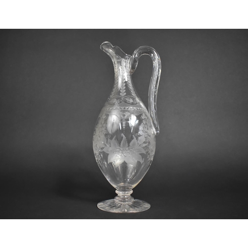 300 - A 19th Century Etched Glass Ewer with Floral Garland and Swag Design, 30cm high