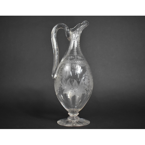 300 - A 19th Century Etched Glass Ewer with Floral Garland and Swag Design, 30cm high