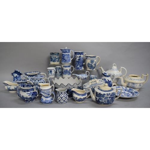 335 - A Large Collection of Various 19th and 20th Century Blue and White Ceramics to Comprise Teapots, Jug... 