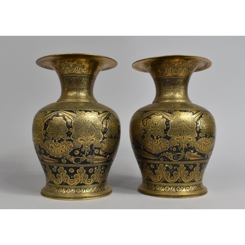 43 - A Pair of Niello Brass Vases with Islamic Decoration, 20cms High