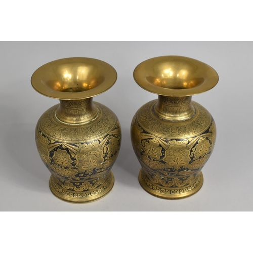 43 - A Pair of Niello Brass Vases with Islamic Decoration, 20cms High