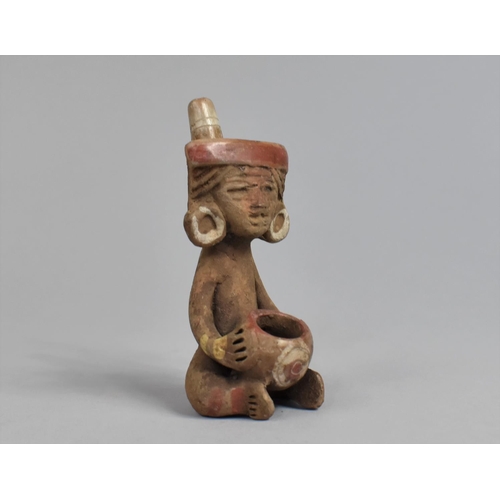 44 - An Early Mexican Terracotta Figural Pipe in the Form of a Seated Gent with Headdress