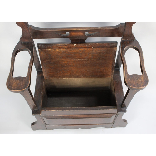 45 - An Edwardian Oak Hall Seat and Stick Stand with Hinged Lid and Pierced Top Rail, 76cms Wide