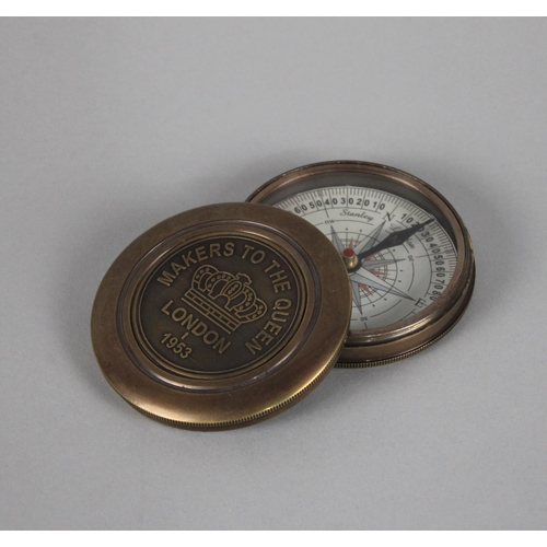 58 - A Reproduction Circular Brass Cased Compass, Screw Off Lid Inscribed Under with Robert Frost, The Ro... 