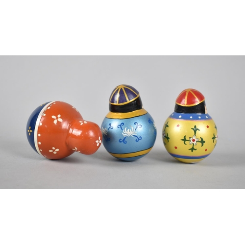 67 - A Set of Three Vintage Russian Figural Painted Roly Poly Chime Dolls