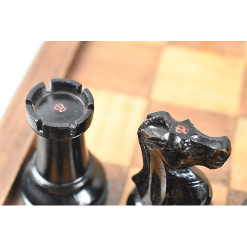 10 - A Good Quality Jaques Staunton Pattern Boxwood and Ebony Chess Set having Weighted Pieces, The Knigh... 