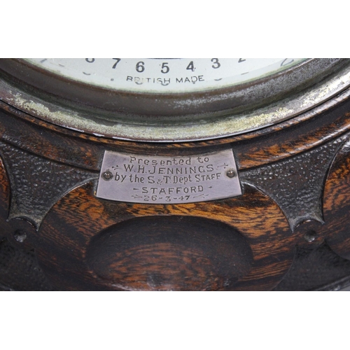 108 - A Mid 20th century Carved Oak Mounted Circular Aneroid Barometer with Presentation Plaque Dated 1947... 