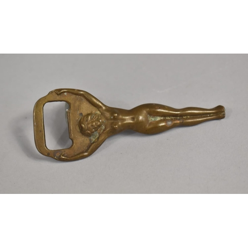 128 - A Mid 20th Century Novelty Brass Bottle Opener in the Form of a Standing Nude, 10.5cms High