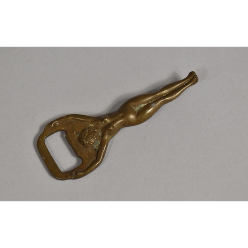 128 - A Mid 20th Century Novelty Brass Bottle Opener in the Form of a Standing Nude, 10.5cms High