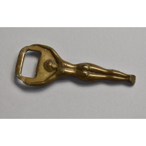 128 - A Mid 20th Century Novelty Brass Bottle Opener in the Form of a Standing Nude, 10.5cms High