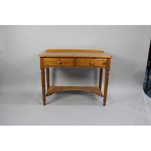 166 - A Modern pine Galleried Two Drawer Side Table, 98cms Wide