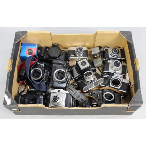 231 - A Collection of Various Vintage Camera Bodies to include Canon, Praktica, Zenith Etc