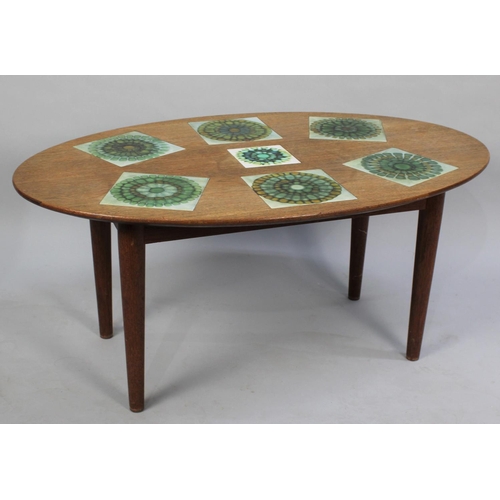 241 - A Mid 20th century Oval Topped Coffee Table with Inset Tiles, 90cms Wide