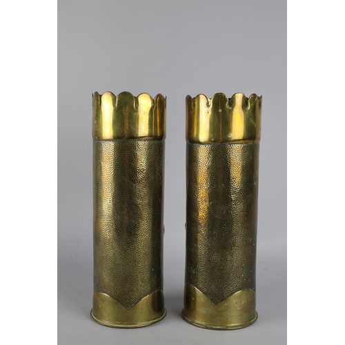 30 - A Pair of Trench Art Brass Shell Cases Decorated in Relief with Roses, 23cms High