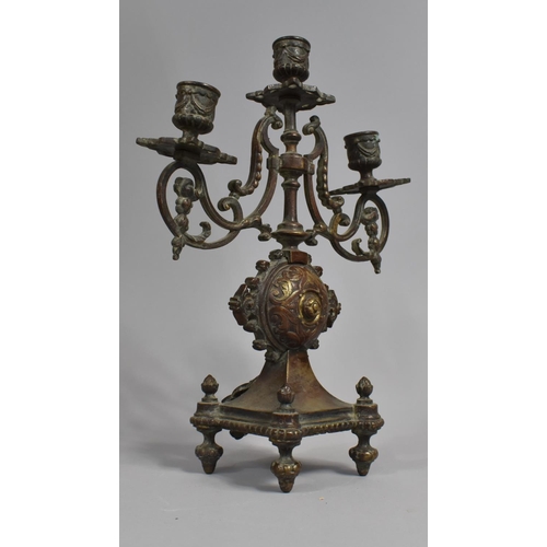 47 - A French Aesthetic Period Patinated Bronze Three Branch Clock Garniture, 32cms High