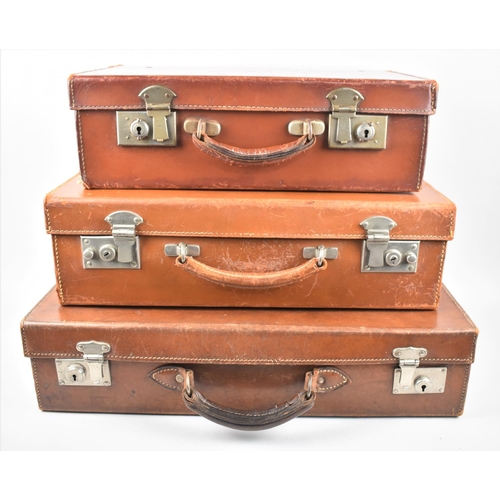 72 - A Collection of Three Various Vintage Gradated Leather Cases, Largest 51cms Wide