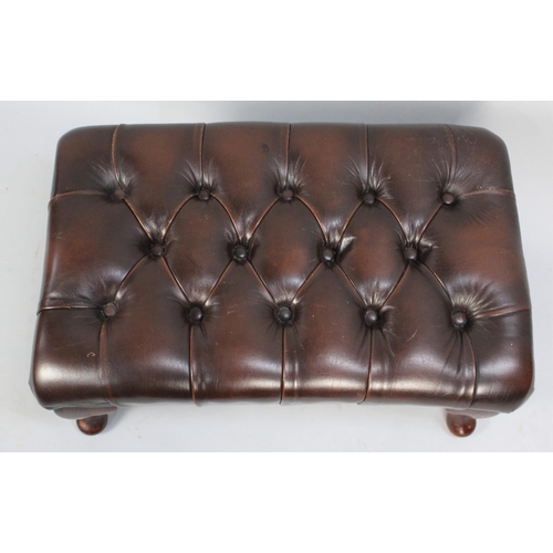 73 - A Modern Buttoned Leather Effect Rectangular Footstool on Cabriole Supports, 65cms Wide