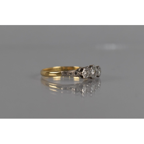 99 - An 18ct Gold and Diamond Trilogy Ring, Centre Stone Approx 0.20ct with Additional Diamonds Either Si... 