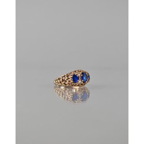 83 - A Late 20th Century 9ct Gold and Sapphire Seven Stone Dress Ring. Central Oval Cut Sapphire Measurin... 