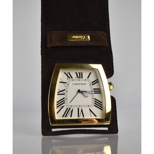 24 - A Cartier La Dona Travel Desk Clock. Shaped White Dial with Roman Numerals, Blue Diamond Shaped Hand... 