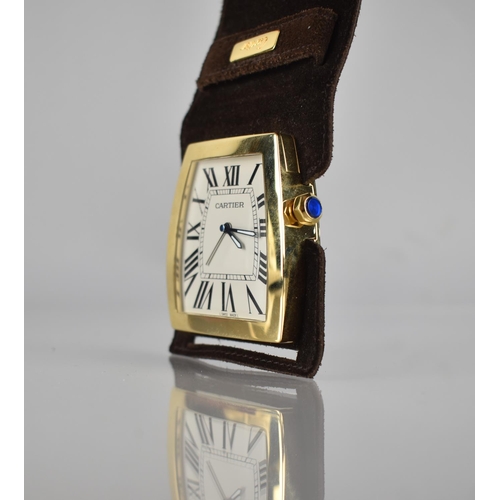 24 - A Cartier La Dona Travel Desk Clock. Shaped White Dial with Roman Numerals, Blue Diamond Shaped Hand... 