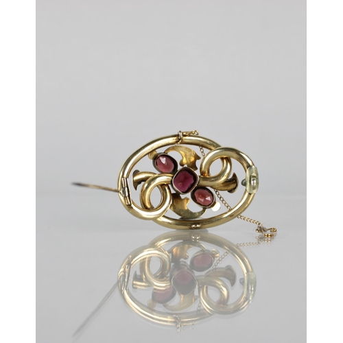 111 - A Victorian Brooch, Three Cut Almandine Garnets, Largest 9.5mm by 8mm, Set in an Etched and Scrolled... 