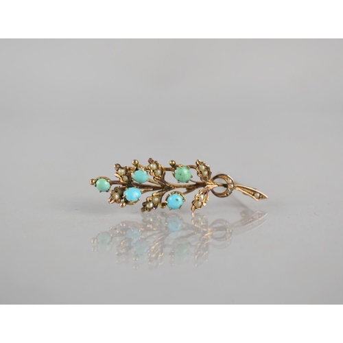 123 - A Late 19th/Early 20th Century 9ct Gold, Turquoise and Seed Pearl Brooch, Sprig of Leaves with Berri... 