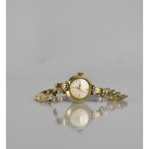 10 - A Vintage Ladies Tudor Wrist Watch, Radiant Fluted Champagne Dial with Gold Coloured Alpha Hands and... 