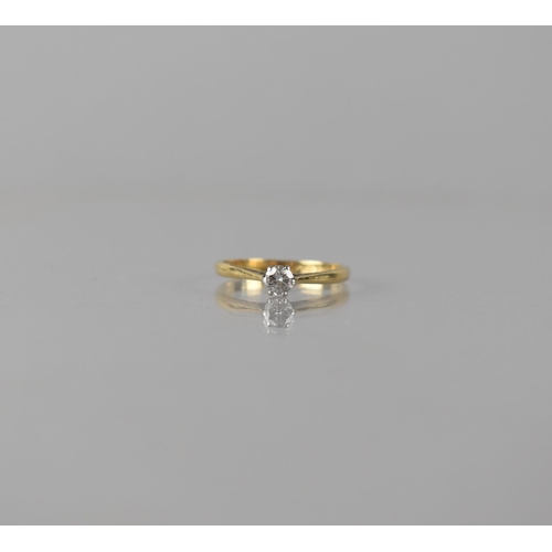 65 - An 18ct Gold and Platinum Diamond Solitaire Ring,  Centre Round Brilliant Cut Stone Measuring Approx... 