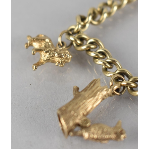 145 - A 9ct Gold Charm Bracelet, Five 9ct Gold Charms on Curb Link Bracelet to include Horse Head, Lion, A... 