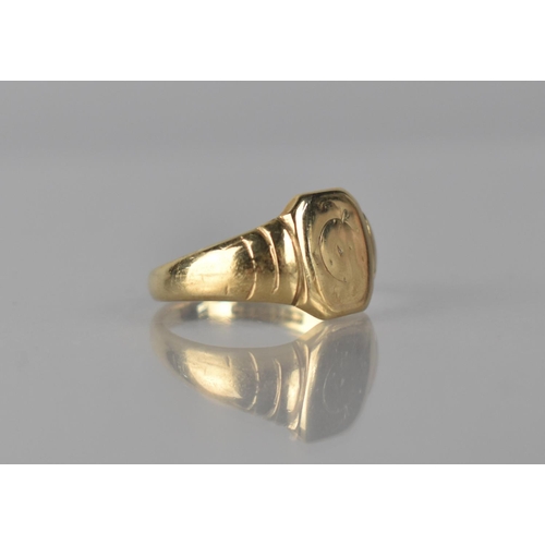 56 - A 9ct Gold Gents Signet Ring, Octagonal Head with Traces of Engraved Decoration, Stepped Shoulders t... 