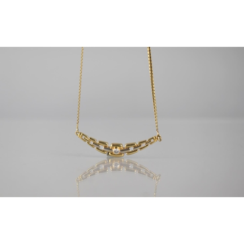 133 - A 14ct Gold Necklace, Centre Two Tone Crescent Panel in the Form of a Graduated Chain and Mounted to... 