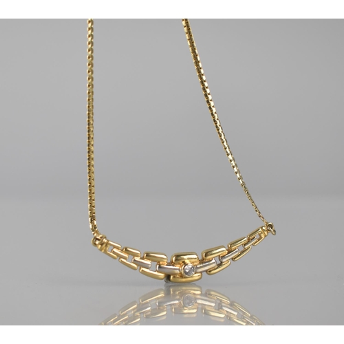 133 - A 14ct Gold Necklace, Centre Two Tone Crescent Panel in the Form of a Graduated Chain and Mounted to... 