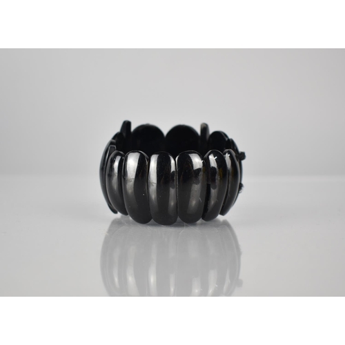 269 - A Vintage Jet Panelled Bracelet, Foremost Ovoid Panels Etched with Geometric Decoration and Measurin... 