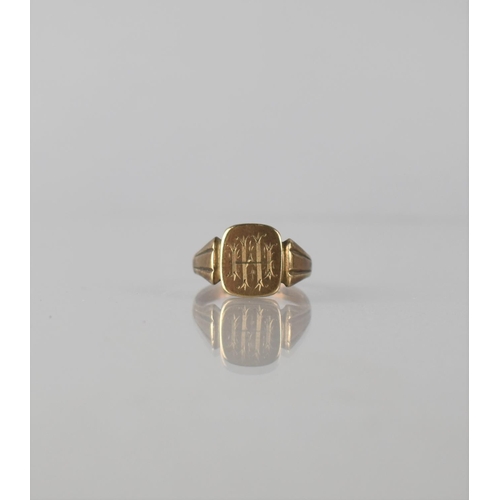 46 - A 9ct Gold Signet Ring, Rectangular Head Monogrammed H M, Tapered Fluted Shoulders to a Flattened D ... 