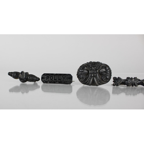 264 - A Collection of Five Victorian and Later Jet Brooches together with Two Black Glass Examples, Larges... 