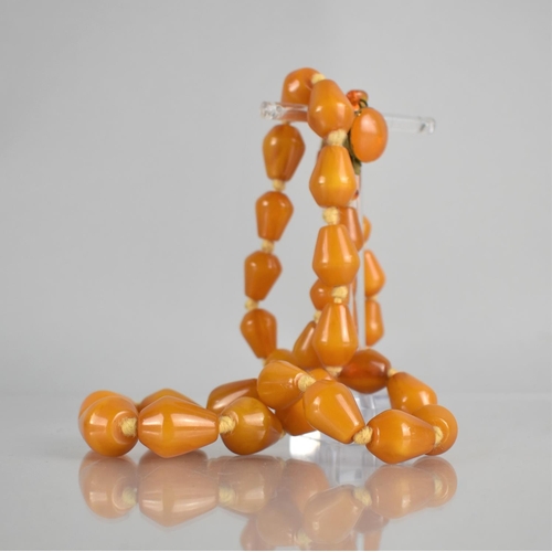 225 - A String of Orange Bakelite Beads, Graduated Truncated Conical Form, Knotted Orange Thread with Vint... 