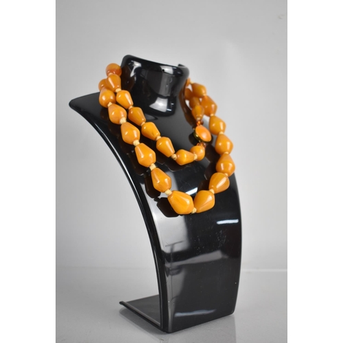 225 - A String of Orange Bakelite Beads, Graduated Truncated Conical Form, Knotted Orange Thread with Vint... 